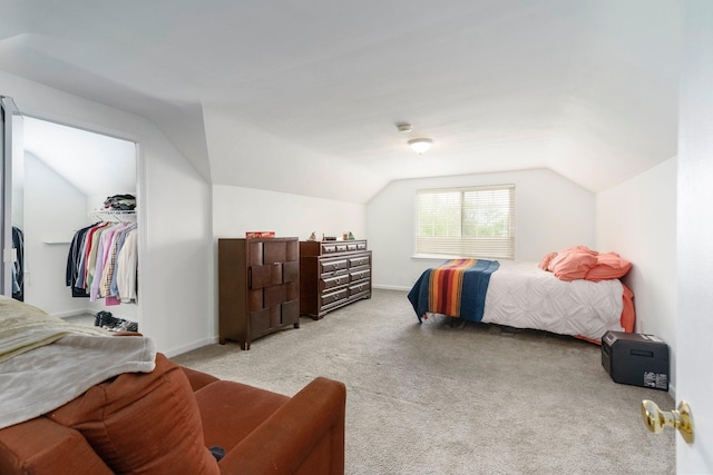 15501 E Jefferson Ave, Grosse Pointe Park, MI 48230 - bedroom featuring lofted ceiling, light colored carpet, a spacious closet, baseboards, and a closet