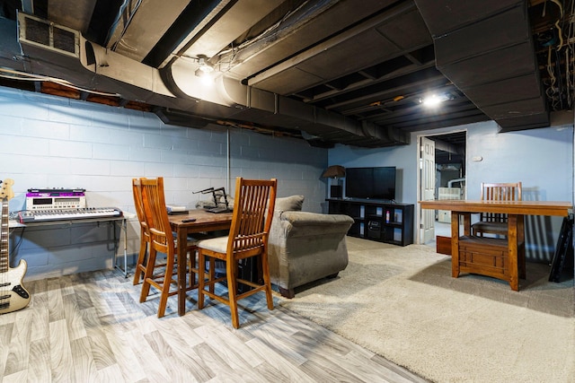 15501 E Jefferson Ave, Grosse Pointe Park, MI 48230 - dining room featuring wood finished floors and concrete block wall