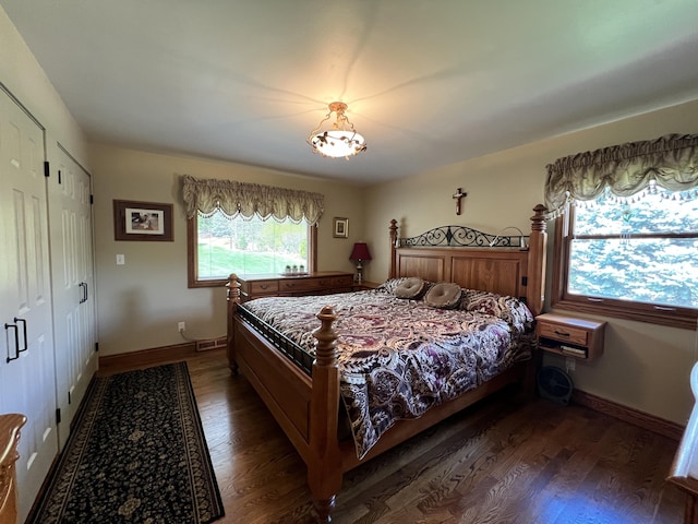 3817 Butterworth St SW, Grand Rapids, MI 49534 - bedroom with wood finished floors and baseboards