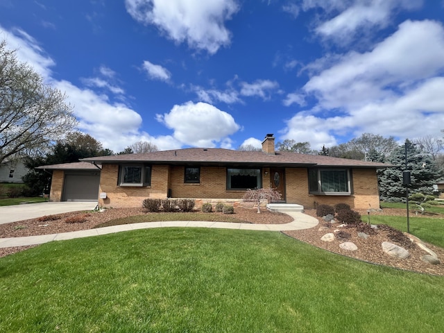 3817 Butterworth St SW, Grand Rapids, MI 49534 - single story home featuring driveway, brick siding, a front lawn, a chimney, and an attached garage
