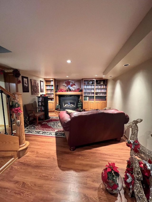 3817 Butterworth St SW, Grand Rapids, MI 49534 - living area with wood finished floors, a fireplace, and recessed lighting