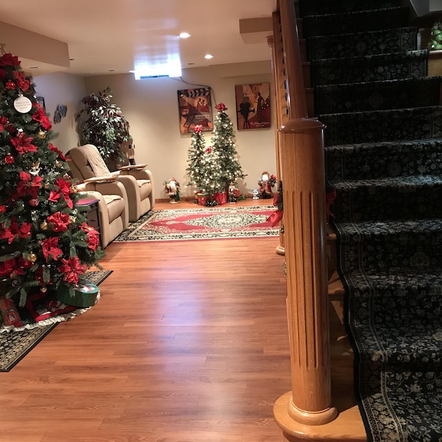 3817 Butterworth St SW, Grand Rapids, MI 49534 - living room featuring wood finished floors, recessed lighting, and stairs