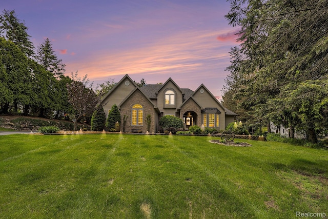 1437 Rillview Ct, Metamora, MI 48455 - view of front facade featuring a lawn and stone siding