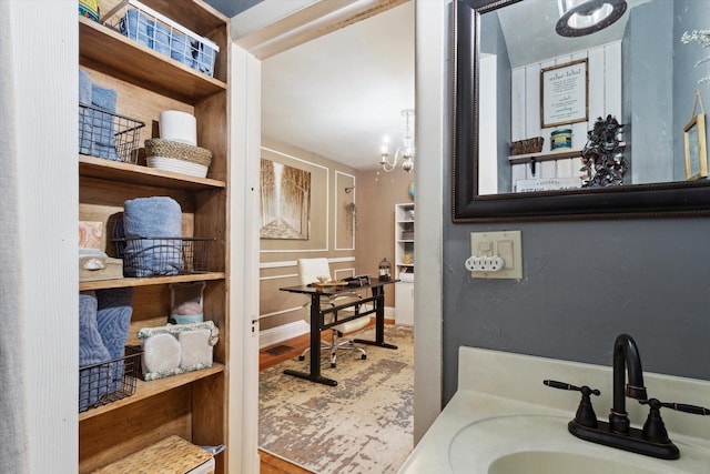 700 S Washington, Mount Pleasant, MI 48858 - bathroom featuring vanity and wood finished floors