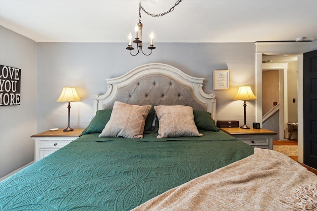 700 S Washington, Mount Pleasant, MI 48858 - bedroom featuring a chandelier
