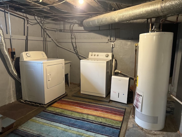 700 S Washington, Mount Pleasant, MI 48858 - laundry room featuring washer and clothes dryer and gas water heater