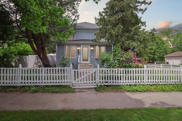 700 S Washington, Mount Pleasant, MI 48858 - view of front facade with a fenced front yard