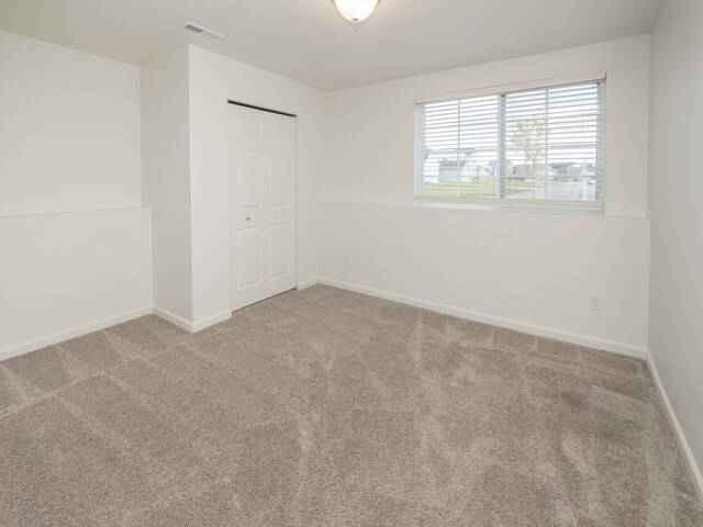 1925 Prescott Trl, Galesburg, MI 49053 - unfurnished bedroom with carpet and baseboards