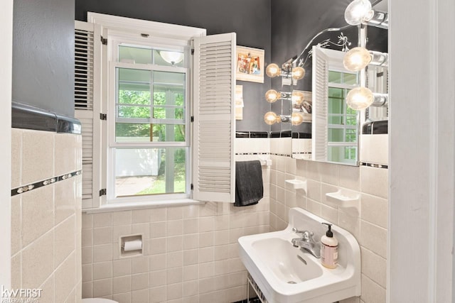 1118 Maxine St, Flint, MI 48503 - bathroom with tile walls and a sink