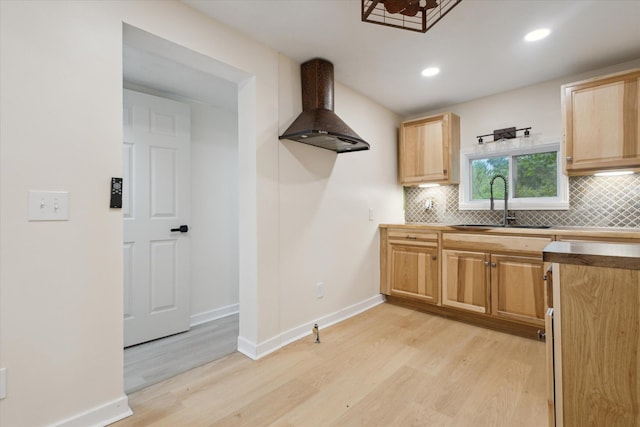 932 Enders Ave, Benton Harbor, MI 49022 - kitchen with wall chimney exhaust hood, light brown cabinets, light wood-type flooring, a sink, and recessed lighting