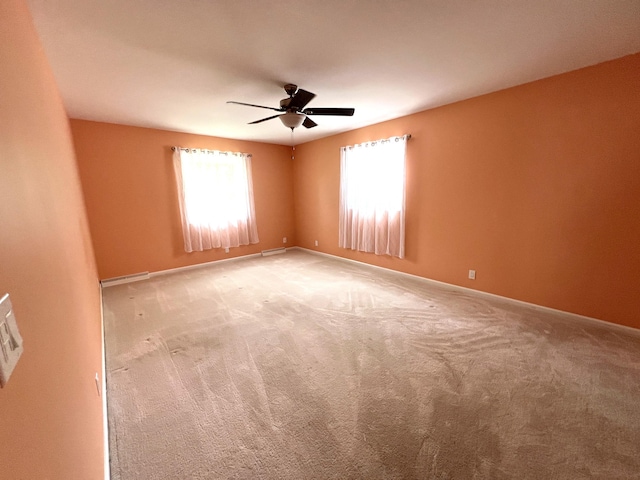 2304 Hickory Point Dr N, Portage, MI 49024 - spare room with a ceiling fan, light colored carpet, and baseboards