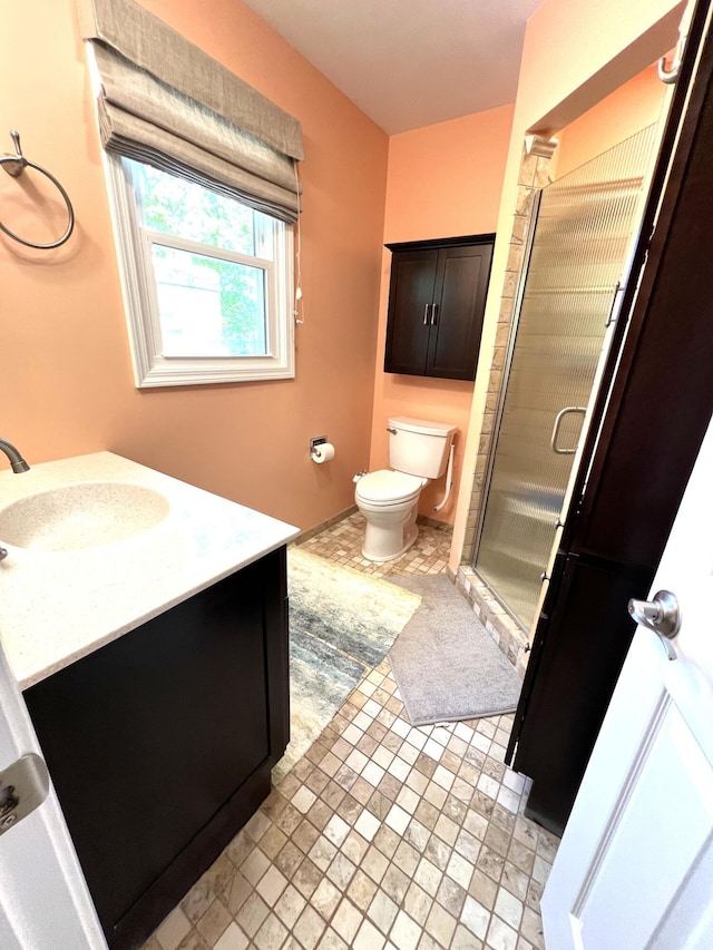 2304 Hickory Point Dr N, Portage, MI 49024 - full bathroom with a stall shower, toilet, and vanity