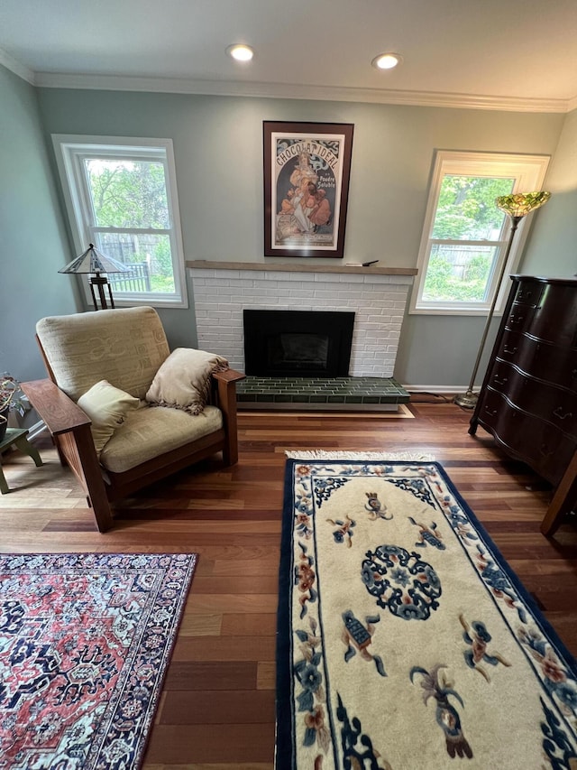 2304 Hickory Point Dr N, Portage, MI 49024 - living room featuring crown molding, a fireplace, wood finished floors, recessed lighting, and baseboards