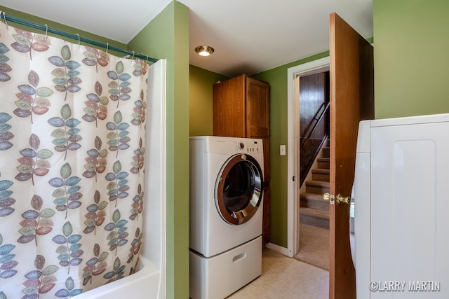 2153 Greenview Ct SW, Wyoming, MI 49519 - washroom featuring washer / clothes dryer and light carpet
