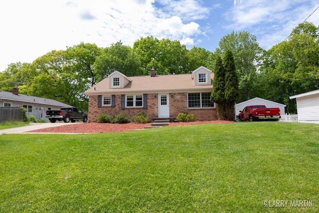 2153 Greenview Ct SW, Wyoming, MI 49519 - view of front of property featuring brick siding, a chimney, and a shingled roof