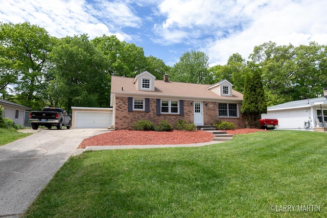 2153 Greenview Ct SW, Wyoming, MI 49519 - cape cod-style house featuring brick siding, a front yard, a chimney, and concrete driveway