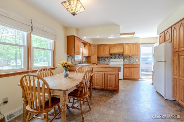 2153 Greenview Ct SW, Wyoming, MI 49519 - dining area featuring healthy amount of natural light and recessed lighting