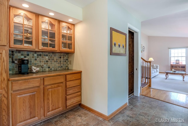 2153 Greenview Ct SW, Wyoming, MI 49519 - bar area with baseboards, backsplash, and recessed lighting