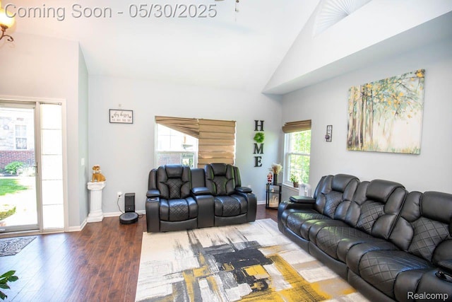 2062 Preserve Cir W, Canton, MI 48188 - living area featuring wood finished floors, baseboards, and high vaulted ceiling