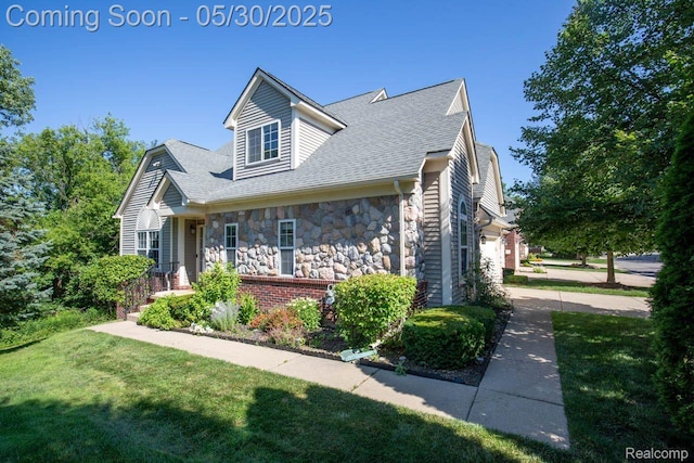 2062 Preserve Cir W, Canton, MI 48188 - view of front of property with stone siding, a front lawn, and a shingled roof