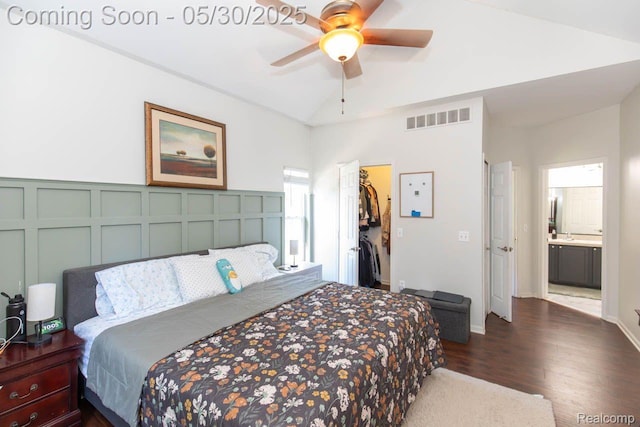 2062 Preserve Cir W, Canton, MI 48188 - bedroom with dark wood-style floors, a spacious closet, lofted ceiling, a closet, and ceiling fan
