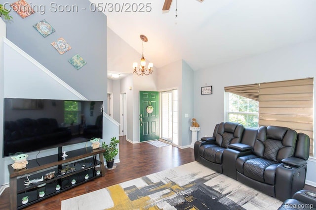 2062 Preserve Cir W, Canton, MI 48188 - living room featuring wood finished floors, ceiling fan, high vaulted ceiling, a chandelier, and baseboards