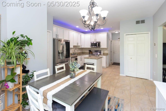 2062 Preserve Cir W, Canton, MI 48188 - dining space with a chandelier, recessed lighting, and light tile patterned floors