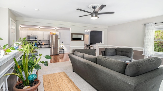 1590 W Rolston Rd, Linden, MI 48451 - living room with ceiling fan and wood finished floors
