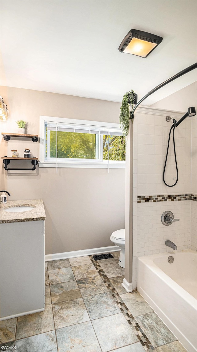 1590 W Rolston Rd, Linden, MI 48451 - full bathroom featuring toilet, vanity, baseboards, and shower / bath combination