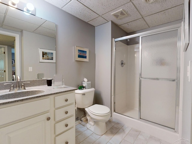 17 E Drake Dr, Saginaw, MI 48603 - full bath with a drop ceiling, toilet, a shower stall, vanity, and marble finish flooring