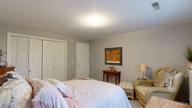 17 E Drake Dr, Saginaw, MI 48603 - bedroom with a closet and light carpet