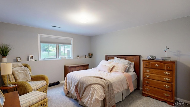 17 E Drake Dr, Saginaw, MI 48603 - bedroom with light carpet and baseboards