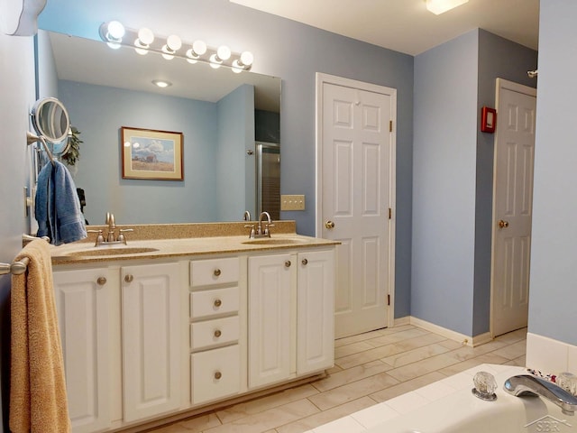 17 E Drake Dr, Saginaw, MI 48603 - bathroom with double vanity, a bath, and an enclosed shower