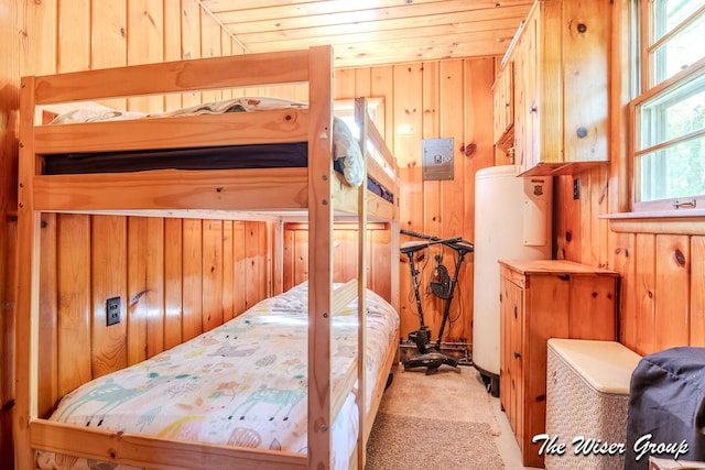 1261 W Channel St, Bitely, MI 49309 - bedroom with wooden walls, carpet flooring, and wood ceiling