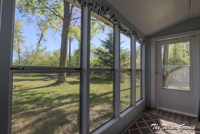 1261 W Channel St, Bitely, MI 49309 - unfurnished sunroom featuring vaulted ceiling