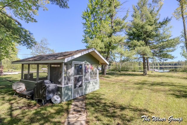 1261 W Channel St, Bitely, MI 49309 - view of outbuilding with a water view