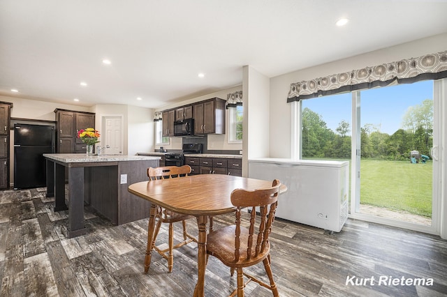 532 48th St, Grand Junction, MI 49056 - dining space featuring dark wood finished floors and recessed lighting