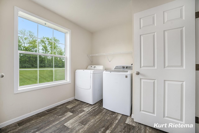 532 48th St, Grand Junction, MI 49056 - laundry room featuring washing machine and clothes dryer, dark wood-style flooring, and baseboards