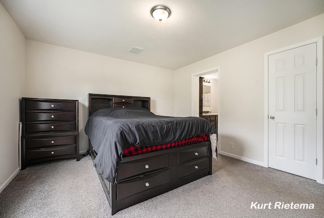 532 48th St, Grand Junction, MI 49056 - carpeted bedroom with baseboards and ensuite bath