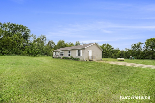 532 48th St, Grand Junction, MI 49056 - view of front of home with a front yard and dirt driveway