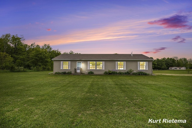 532 48th St, Grand Junction, MI 49056 - ranch-style home featuring a lawn