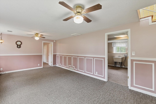 530 Manitou Rd, Saint Joseph, MI 49085 - carpeted spare room featuring a ceiling fan and a sink
