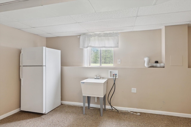 530 Manitou Rd, Saint Joseph, MI 49085 - basement with freestanding refrigerator, a drop ceiling, carpet, and baseboards