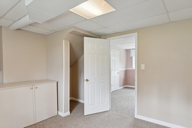 530 Manitou Rd, Saint Joseph, MI 49085 - corridor with a paneled ceiling, light colored carpet, and baseboards