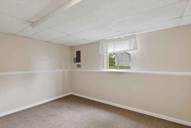 530 Manitou Rd, Saint Joseph, MI 49085 - spare room with carpet, a paneled ceiling, and baseboards