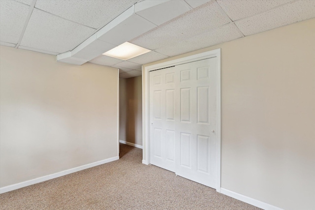 530 Manitou Rd, Saint Joseph, MI 49085 - unfurnished bedroom with a drop ceiling, carpet, a closet, and baseboards