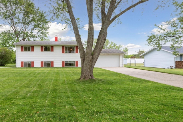 530 Manitou Rd, Saint Joseph, MI 49085 - view of front of property with concrete driveway and a chimney