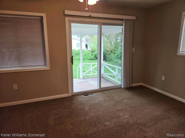 174 Hickory Dr, Troy, MI 48083 - carpeted empty room with baseboards and ceiling fan