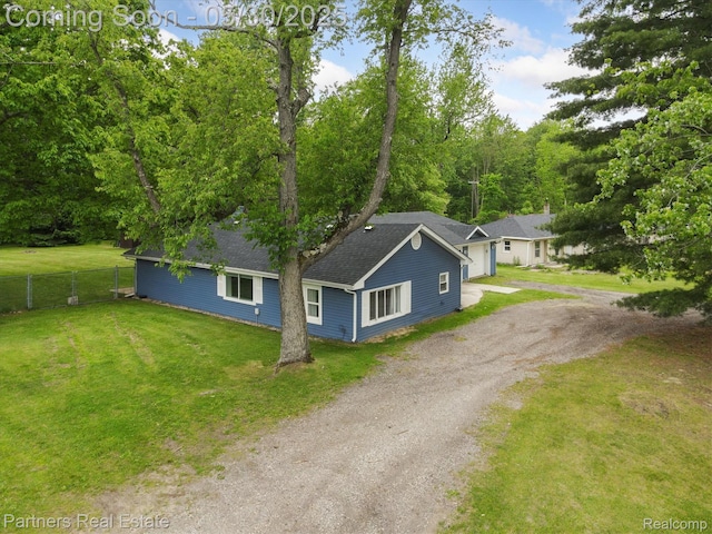 11651 Mason Rd, Webberville, MI 48892 - view of front facade with driveway and roof with shingles