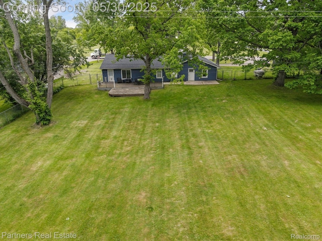 11651 Mason Rd, Webberville, MI 48892 - view of yard featuring a wooden deck